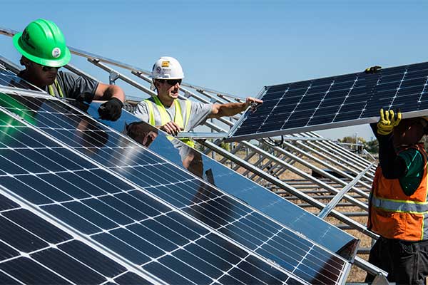 Electric vehicle charging station paired with rooftop solar